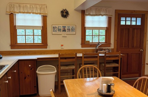 West Tisbury House | serene wooded 3-bedroom house West Tisbury deck, screen porch and outdoor shower