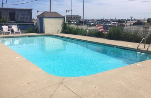 Hampton Condo | Serenity by the Sea Beach Condo with Free WiFi, Shared Pool, & Ocean Views