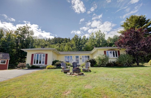 Gilford House | Single-story home overlooking Lake Winnipesaukee with firepit, fireplace & WiFi
