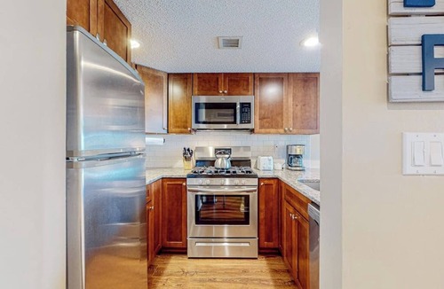 Ludlow Condo | Ski-in/out condo with mountain views, fireplace, pool, & hot tub