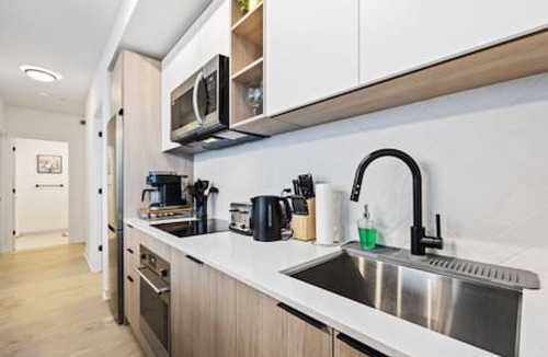 The Queensway Condo | Skyline Haven - Modern 3-BD City View Retreat