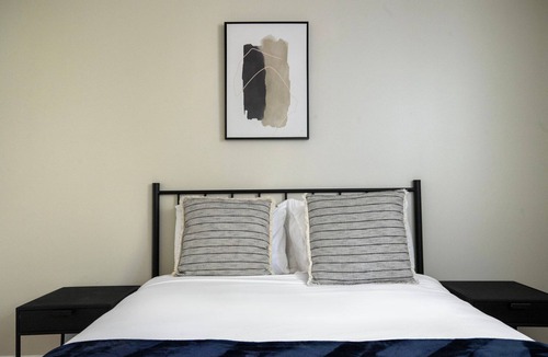 North Cambridge Apartment | Sleek Porter Square 1BR w/ Gym & W/D, nr T Stops, by Blueground