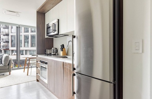 Seaport District Apartment | Sleek Seaport Studio w/Gym & W/D, nr Restaurants, by Blueground