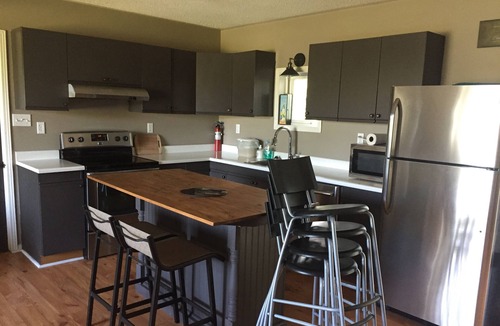 Carrying Place House | Spacious deck with BBQ, lots of seating for entertaining plus Outdoor bonfire