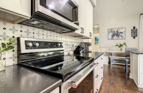 Interchange Square House | Spacious luxury with heated pool.