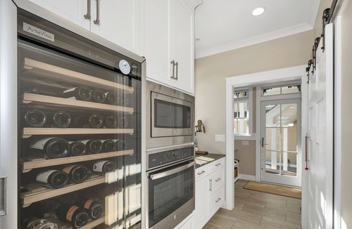 Gilford House | Spectacular Winnipesaukee Point Lot With Custom Home and Separate Guest Space