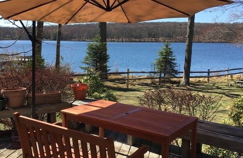 Milford House | Spring fed Lake front home floating dock and boats