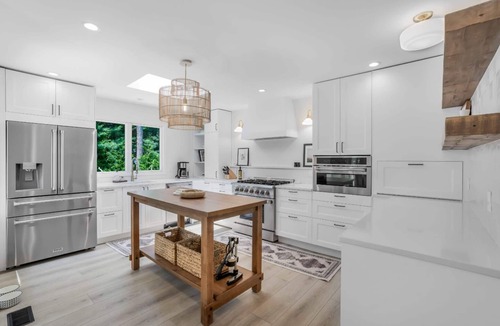 Springs House | Springs Retreat: Fully Renovated Home, New Gunite Pool, Walk to Bay & Rita's
