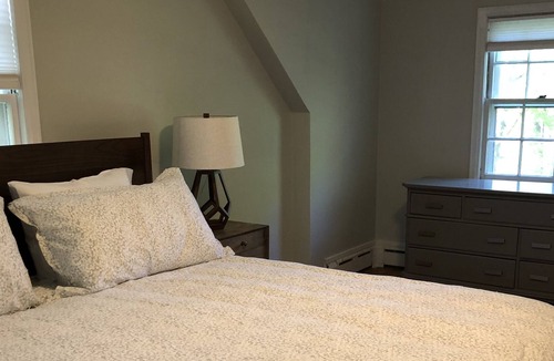 Lenox House | Steps away from shops and restaurants of Lenox Village, with private forest