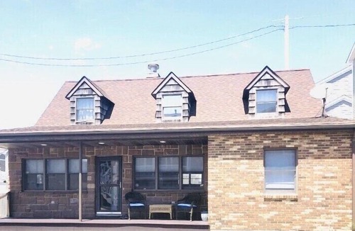 Normandy Beach House | Steps from beach. Ocean block. Family friendly 6 bedroom, 3 bathroom home.