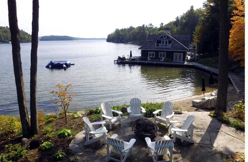 Seguin Cottage | Stunning 6 brdm, 7 bath cottage on Lake Joe! Sand Beach! Boathouse! Has it All!