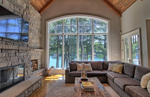 Muskoka Lakes Villa | Stunning Cottage on Lake Joe! 6 bdrm,6 bath,2 slip boathouse! Water Toys Galore!