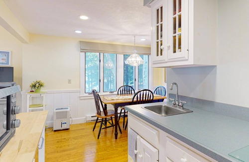 Moultonborough House | Stunning lakefront property with beach access, a dock, spacious yard, & W/D
