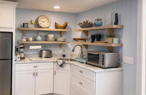 Portsmouth House | Stunning Waterfront Home-Outdoor Kitchen & Living, Pizza Oven, Fireplace & Dock