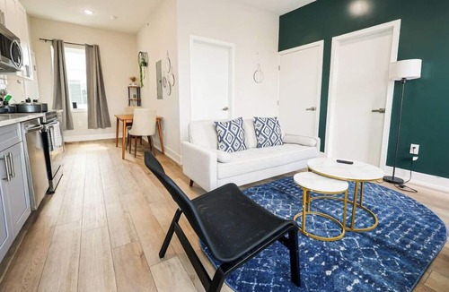 North Philadelphia East Apartment | Stylish 1BR retreat in the heart of Philadelphia! Enjoy a plush king bed, sleek modern kitchen & sunlit interior with upscale finishes throughout. Effortless self-check-in plus on-site parking. Perfect for business trips or a fun weekend getaway.
