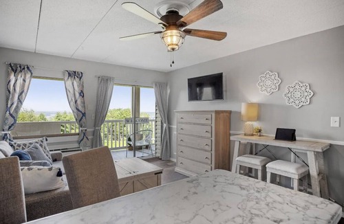Weirs Beach Condo | Sunrise and Lake Winni views on your private balcony!