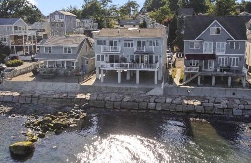 Milford House | Sunrise Waterfront Retreat