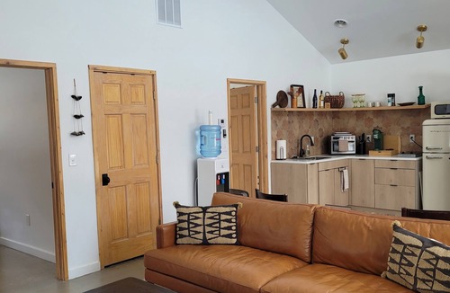 Austinburg Villa | The Cork Cottages Unit 2, Arcade Table, 1K/1Q 2 Bath, New and Modern