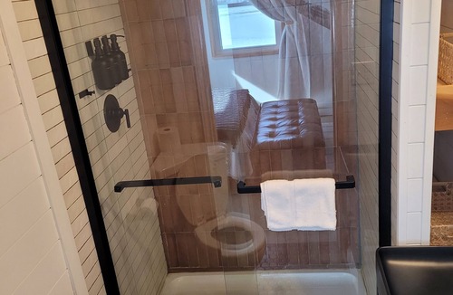 Austinburg Villa | The Cork Cottages Unit 2, Arcade Table, 1K/1Q 2 Bath, New and Modern