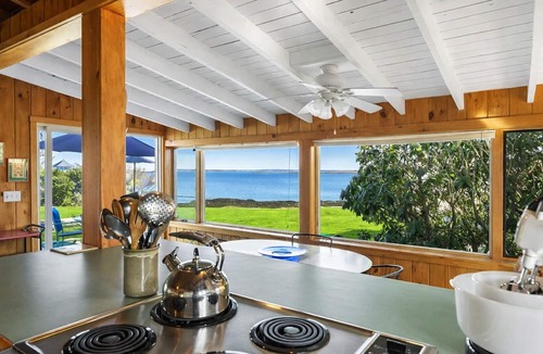Mid-Coast and Islands Cottage | The Yellow Cottage is a 2-bedroom little getaway located right on its own private beach.