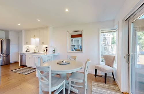 Gilford House | Tranquil lakeside retreat with beach access, pool, firepit, & lovely patio views