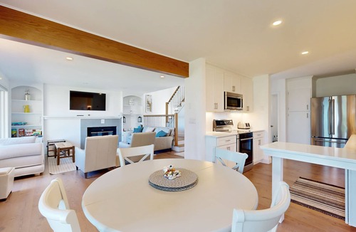 Gilford House | Tranquil lakeside retreat with beach access, pool, firepit, & lovely patio views