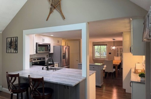 Bridgton House | Tranquil Mountain Escape with Modern Comforts, Deck, Fire Pit, and Shared Pools