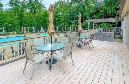 Bridgton House | Tranquil Mountain Escape with Modern Comforts, Deck, Fire Pit, and Shared Pools