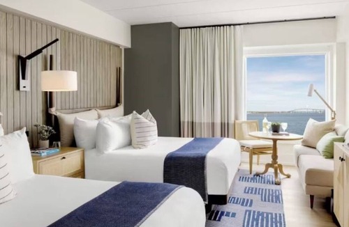 Goat Island Hotel | Tranquil Newport Getaway: Four Serene Waterview Rooms | Pets are Allowed