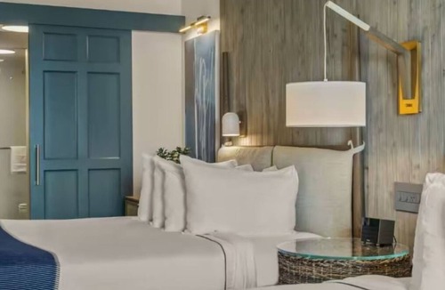 Goat Island Hotel | Tranquil Newport Getaway: Four Serene Waterview Rooms | Pets are Allowed