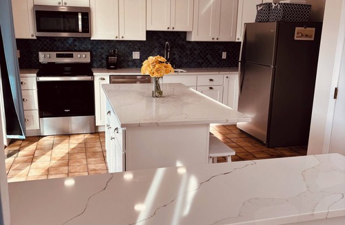East Falmouth House | Tranquil Waterfront Retreat dock perfect Family Getaways 7 min drive to beach
