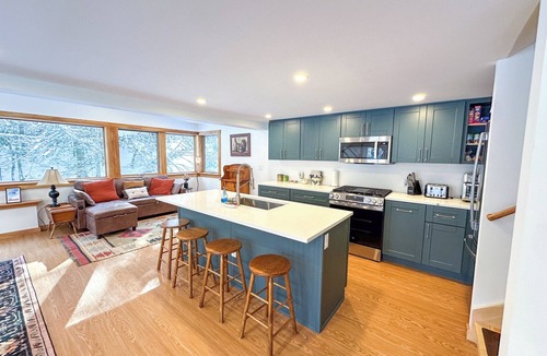 Moretown House | Tucked away on nearly two private acres and surrounded by peaceful woodland, this cozy yet modern 3 bedroom, 2 bathroom, home offers the perfect blend of seclusion and easy access to Vermont’s best outdoor adventures—year-round.