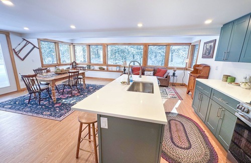 Moretown House | Tucked away on nearly two private acres and surrounded by peaceful woodland, this cozy yet modern 3 bedroom, 2 bathroom, home offers the perfect blend of seclusion and easy access to Vermont’s best outdoor adventures—year-round.