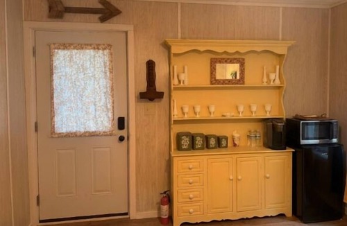 Middle Grove Cabin | Two cabins in one space. Enjoy your own private space in the cozy woods. Cabin is divided into two separate rooms. Dog friendly
