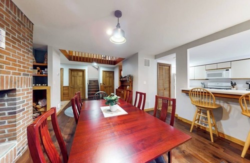 Ludlow Condo | Two-story condo with forest views, Echo Lake beach access, pool, dock & tennis