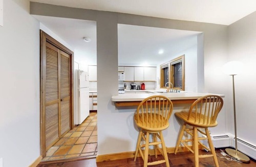 Ludlow Condo | Two-story condo with forest views, Echo Lake beach access, pool, dock & tennis