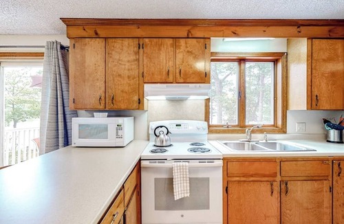 South China House | Two-story lakefront home with a seasonal dock, furnished deck, & washer/dryer