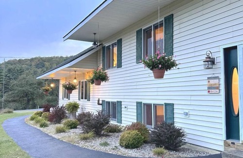 Johnsburg House | Unique Glamping Rental near Mt.Gore, New York, with Hot Tub, Heated Pool, and Playroom