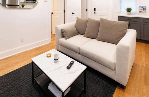Corn Hill House | Unwind in this well-maintained unit with free parking, a fully stocked kitchen, and an in-suite washer/dryer. Perfect for work or leisure travel, this comfortable space has everything you need for a relaxing stay.