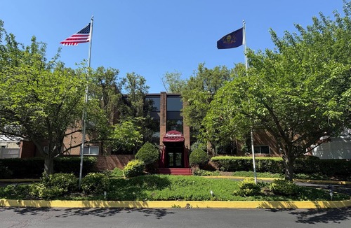 Elkins Park Apartment | Updated 1BR Top-Floor Condo | Fenced Yard | Pool & EV Charger