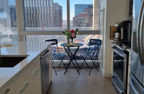 MIT Apartment | Upscale home with breathtaking view, full kitchen, living room and balcony