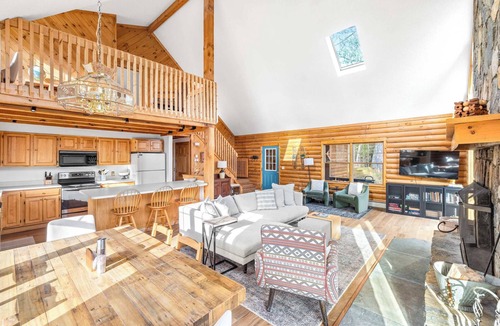 Weston House | Vermont Log Cabin, Stone Fireplace & Forest Deck