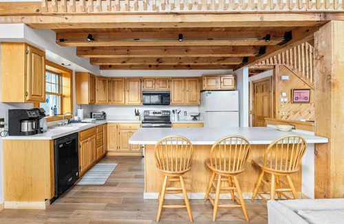 Weston House | Vermont Log Cabin, Stone Fireplace & Forest Deck