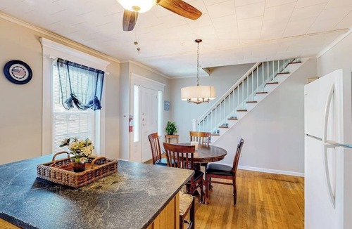 Colchester House | Warm & inviting retreat with a full kitchen, gas fireplace, & furnished patio