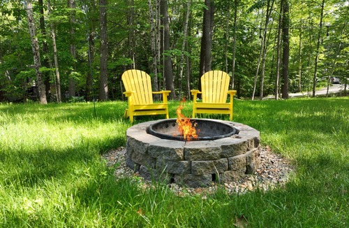 Raymond Cottage | Water view home with kayaks, dock access, firepit, & charming interior - dogs ok