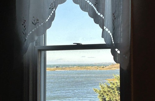 East Falmouth Cottage | Waterfront cape style cottage on private road with private beach access