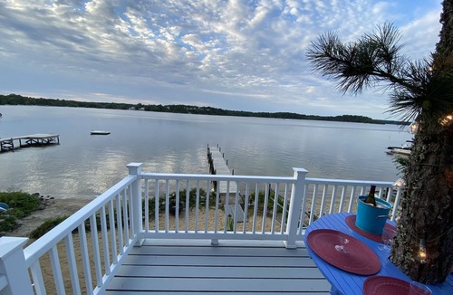 Northwest Harwich House | Waterfront lake house private beach dock