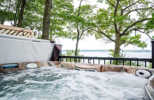 Geneva House | Waterside Leisure Lakefront Hot Tub & Game Room