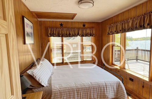 Gilford House | Winnipesaukee Beach house sits on 100’ of frontage and includes a dock slip