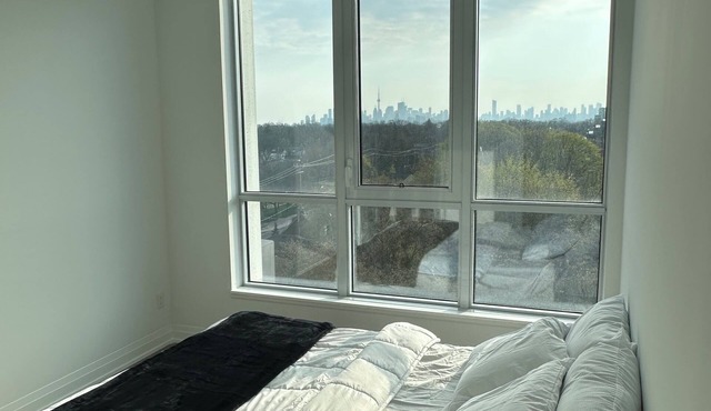 2 BEDROOM WITH CLEAR VIEWS OF THE TORONTO SKYLINE 2KMS FROM WOODBINE BEACH in Toronto